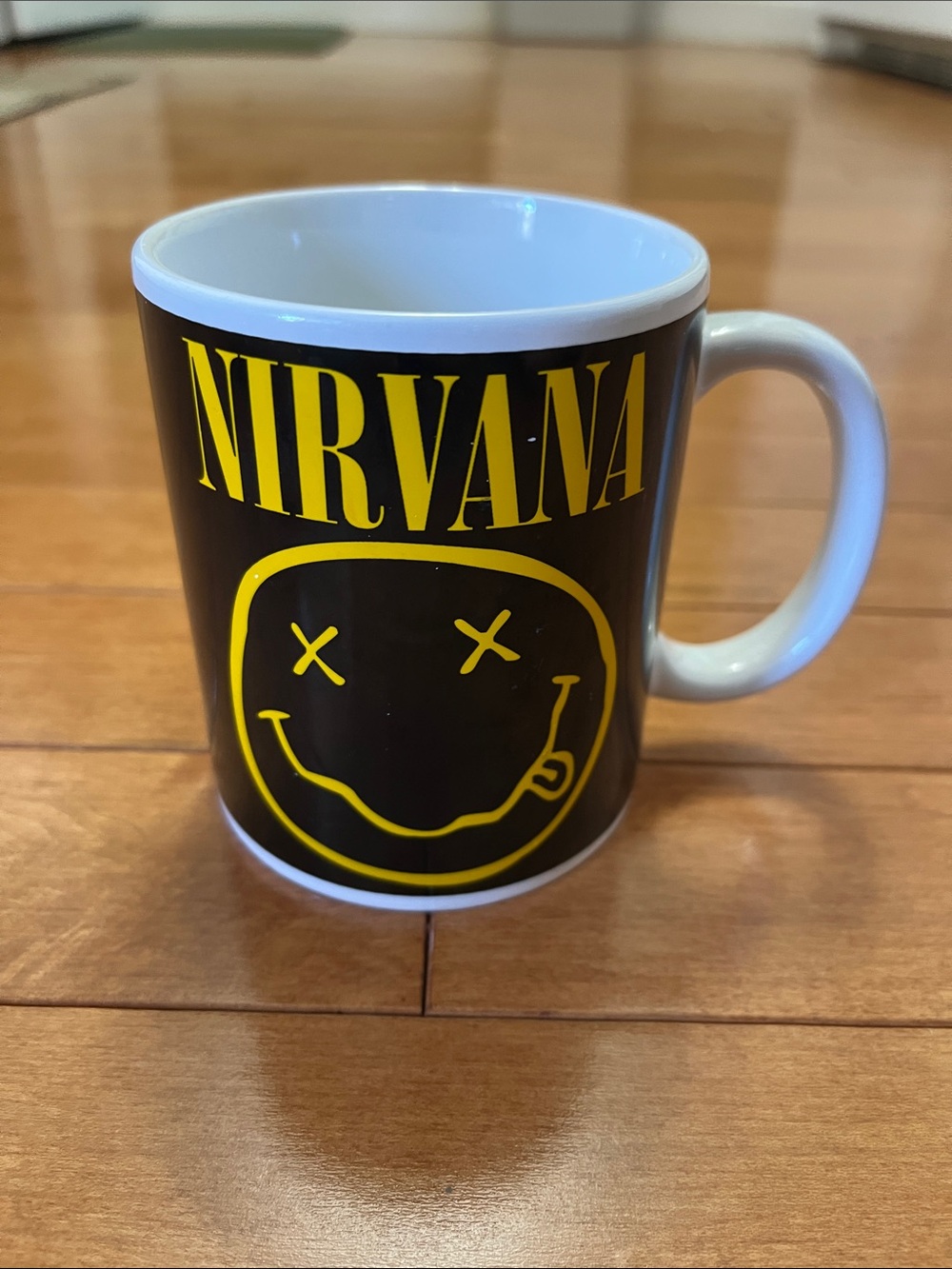NIRVANA Black Mug with Yellow Smiley Logo